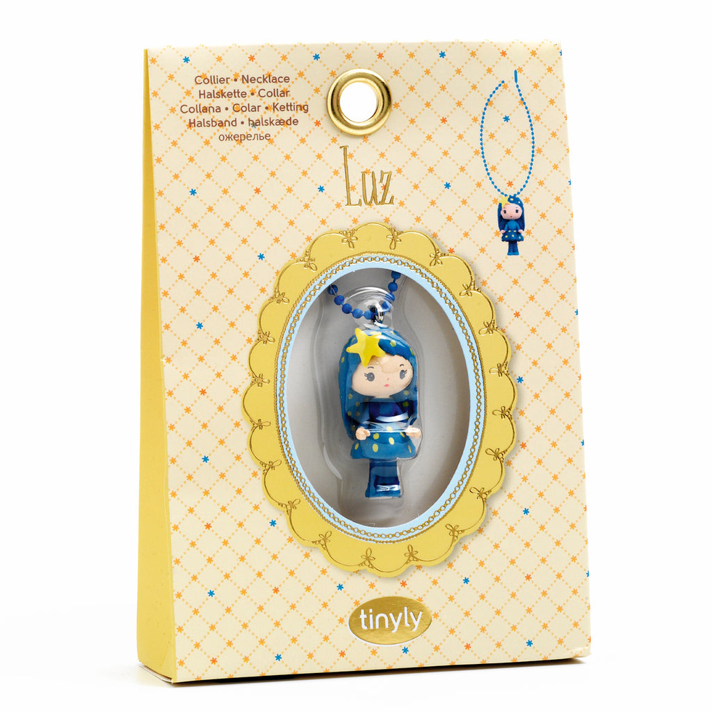 A colorful necklace featuring a finely sculpted figurine of Luz, a character from Djeco's Tinyly collection.