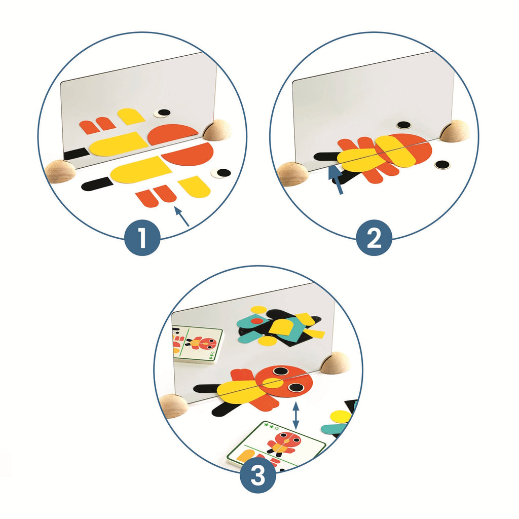 A colorful wooden puzzle setup features a mirrored image of a red bird with yellow and black pieces, alongside a design card and additional shapes.