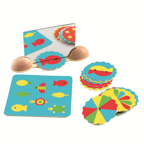 Colorful memory game set featuring aquatic and whimsical creature cards, a mirror, and a wooden holder on a white background.