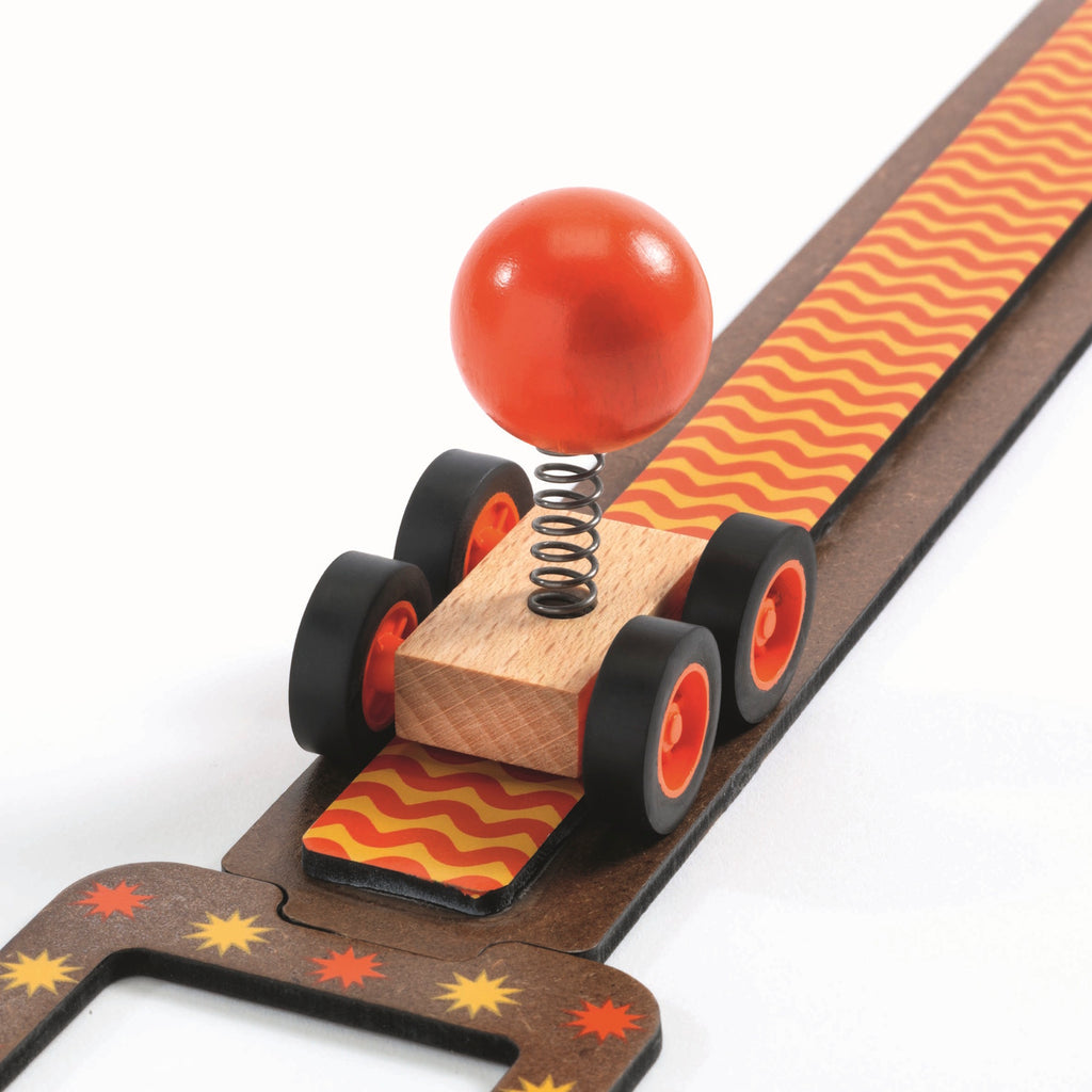 The set includes a tunnel for surprise effects, a wacky car, and humorous Zig domino characters.