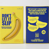 Front and back packaging of the "Don't Let It Slip" game on a white background.