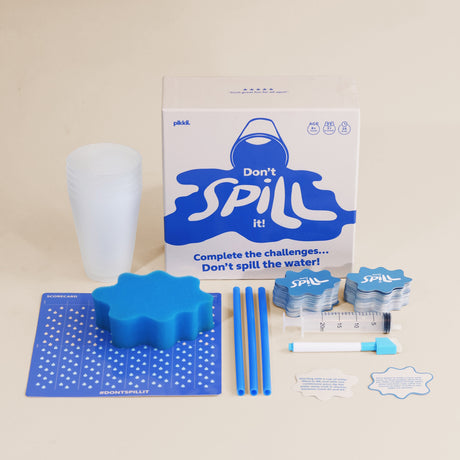 Don't Spill It! game box with components: cups, sponge, straws, syringe, scorecard, and cards.