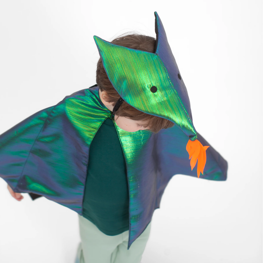Featuring a shiny green dragon cape with fabric scales and gold accents, perfect for imaginative play and costumes.