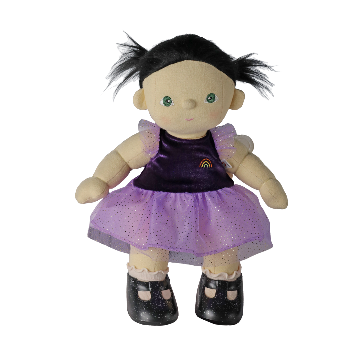 Plush doll with dark pigtails in a purple sparkly dress and black shoes, set against white background.
