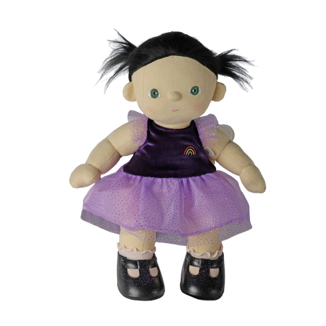 Plush doll with dark pigtails in a purple sparkly dress and black shoes, set against white background.