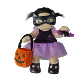 Plush doll in a cat mask holding a pumpkin bag and plush candy toy against a white background.