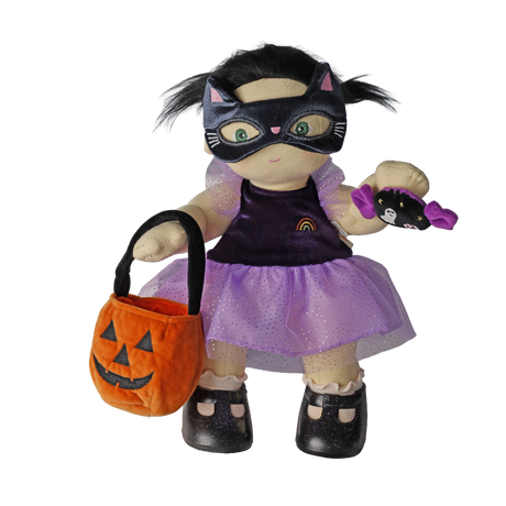 Plush doll in a cat mask holding a pumpkin bag and plush candy toy against a white background.