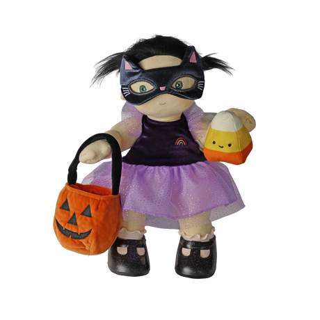 Plush doll in a cat mask holding a pumpkin bag and candy corn plush against a white background.