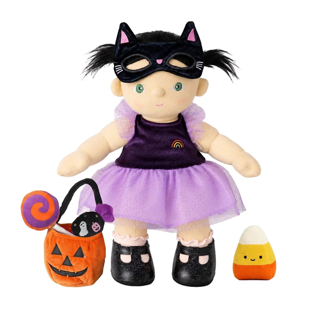 Plush doll in a cat mask and purple Halloween dress, beside a treat bag and candy plushies.