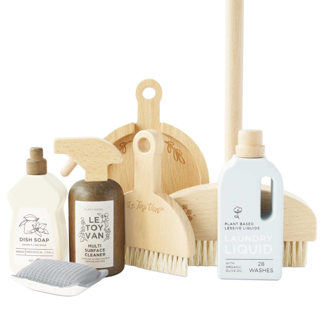 Wooden toy cleaning set featuring dish soap, multi-surface cleaner, and laundry liquid. Includes brushes and a sponge. Neutral tones, playful design.