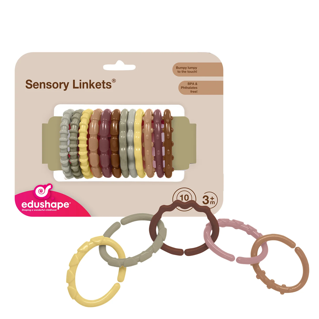 Edushape Sensory Linkets in packaging, featuring textured, interlocking rings in pastel colors. Suitable for ages 3 months and up. Engaging toy.