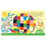 Colorful patchwork elephant Elmer from David McKee's book, standing in a vibrant jungle with a yellow sun.