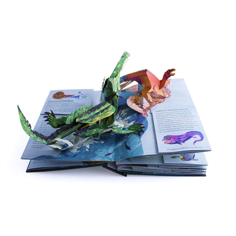 A pop-up book open to a page with colorful, intricate 3D dinosaur and nature scenes. The playful design conveys a sense of wonder and exploration.