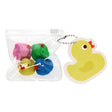 A clear bag holding four colorful rubber duck toys: pink, green, yellow, and blue, alongside a yellow duck keychain tag.