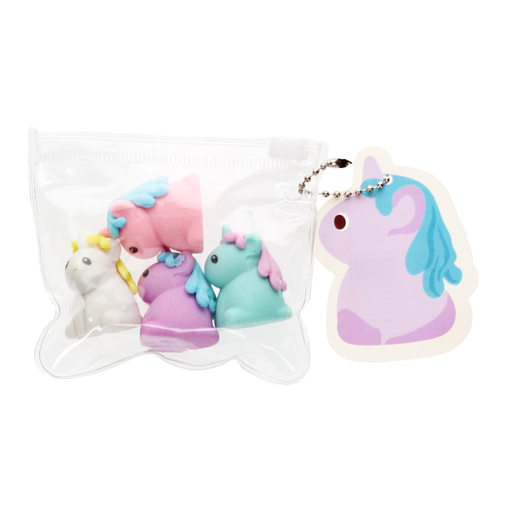 A transparent pouch containing colorful unicorn erasers in pink, blue, purple, and white, with a unicorn-shaped tag attached.