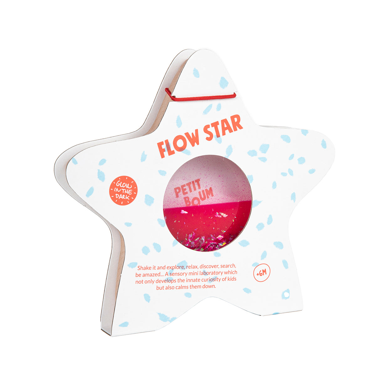 A star-shaped wooden sensory toy by Petit Boum, featuring pink glittery liquid inside, with packaging labeled "Flow Star" and "Glow in the Dark."