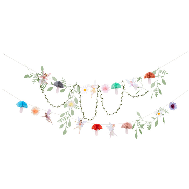 Fairy themed party garland with tissue paper mushrooms, flowers, greenery leaves, and magical fairies.