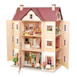 Large multi-storey wooden dollhouse open on all sides showing furnished interior rooms.