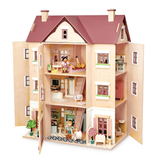 Large multi-storey wooden dollhouse open on all sides showing furnished interior rooms.