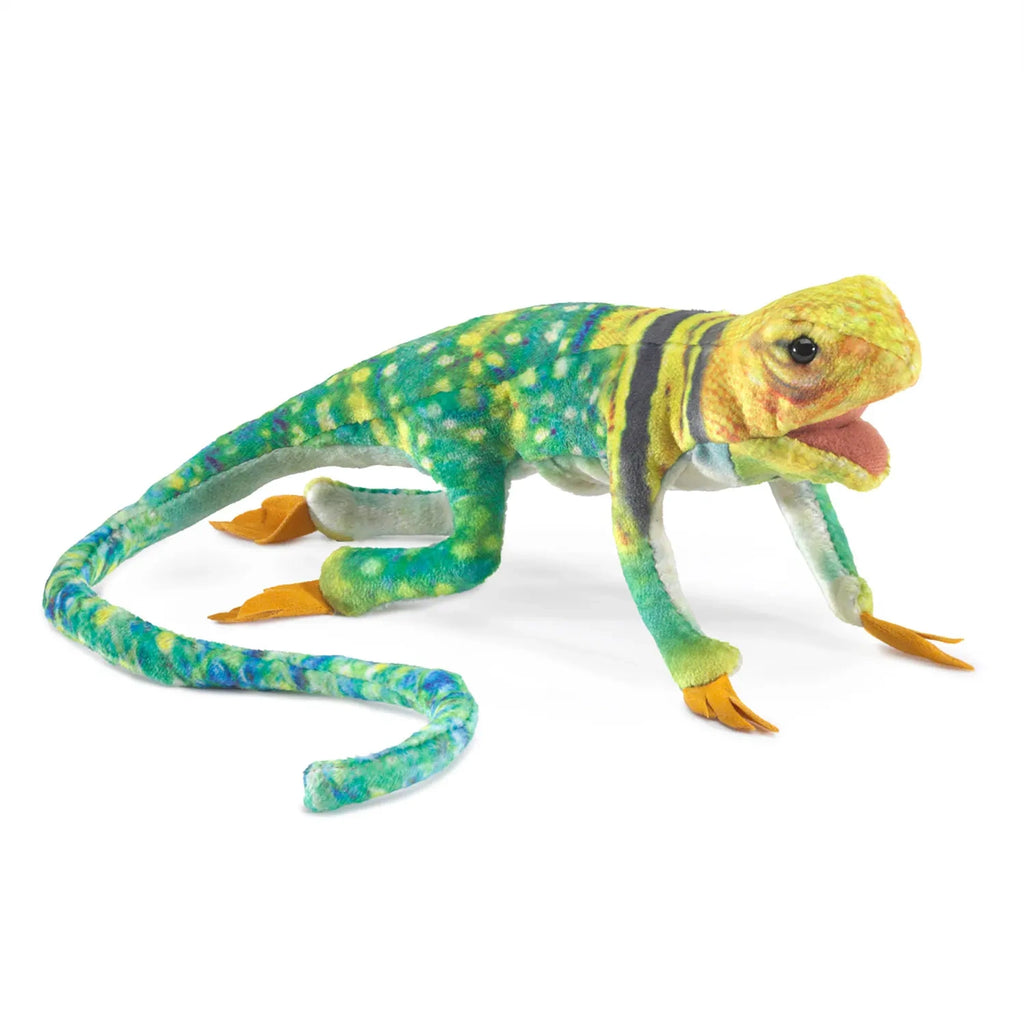 Colorful iguana plush toy with vibrant green, yellow, and blue patterns, orange feet, and an open mouth, conveying a playful and lively tone.