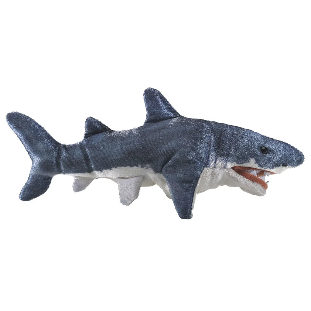 Soft toy shark with realistic features, gray body, white underbelly, and open mouth showing teeth. Lighthearted, playful tone.