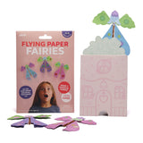 Flying Paper Fairies craft kit packaging next to paper house and assembled flying fairies.