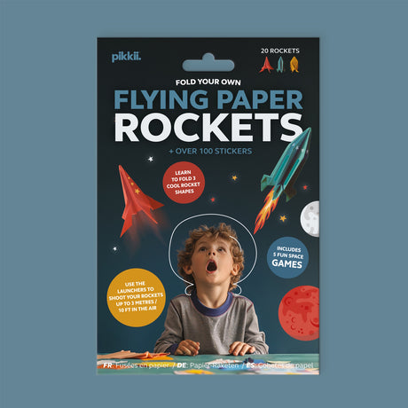 Flying Paper Rockets kit front packaging featuring a boy looking up at flying paper rockets.