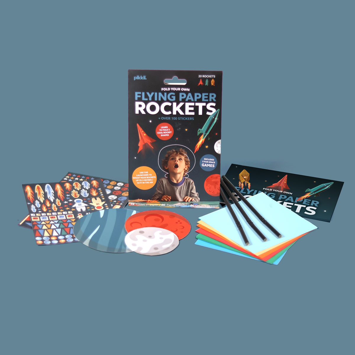 Flying Paper Rockets craft kit packaging with stickers, launch straws, and colorful origami paper.