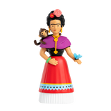 Colorful figurine of a woman with a monkey on her shoulder, wearing a red dress and purple shawl, holds a blue butterfly against a white background.