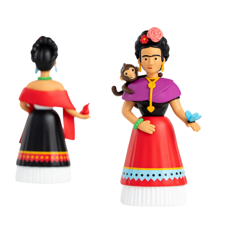 Two colorful figurines on a black background represent a woman with traditional attire, adorned with flowers, a monkey on her shoulder, and a blue butterfly.