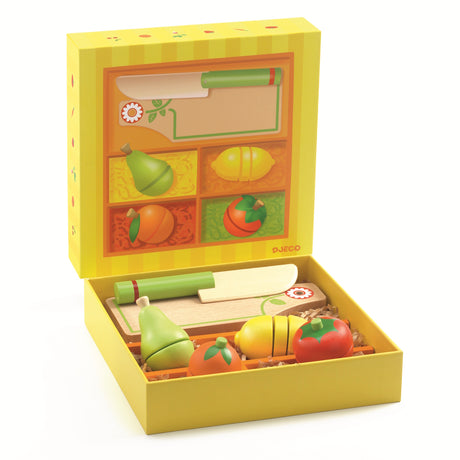 Djeco wooden fruit cutting set for toddlers with play knife, cutting board, and velcro sliceable fruit pieces.