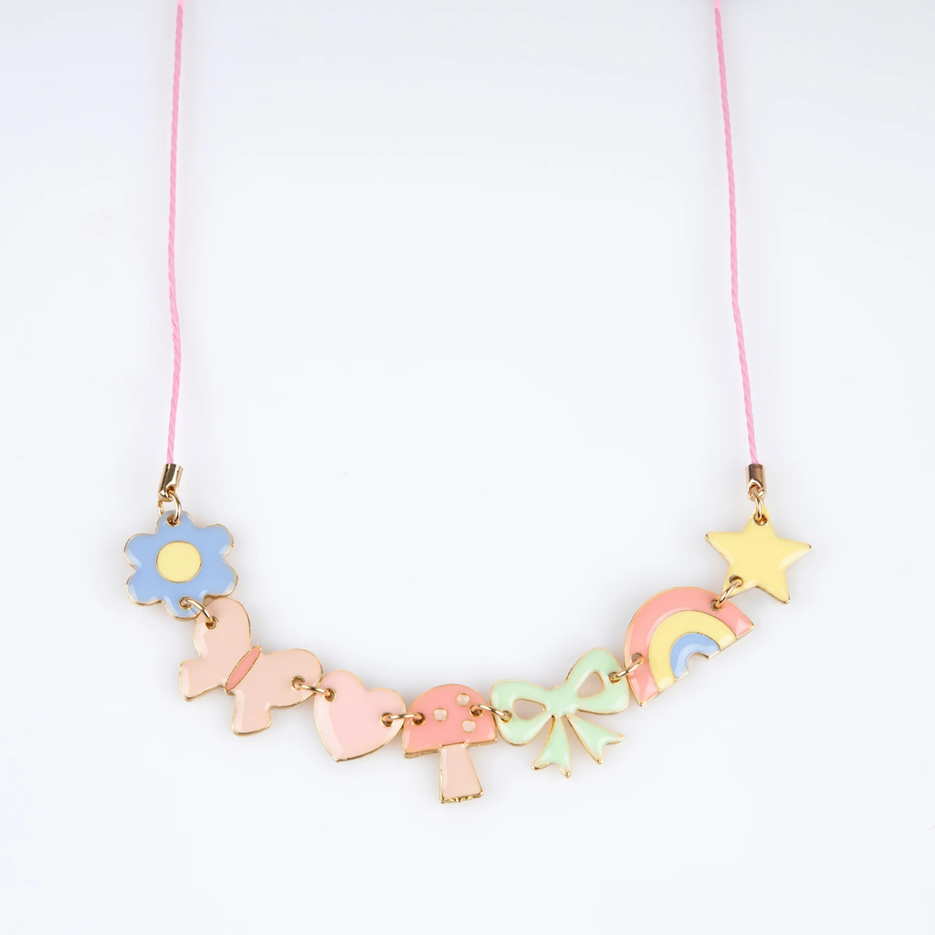 A playful gold-tone necklace featuring colorful enamel charms like a star, rainbow, and heart, perfect for fun and stylish accessorizing.