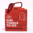 Red "100 Fun Things To Do While travelling" card deck attached to a red hanging loop.