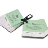 Green activity cards on a clip showing #36 Stick Puzzles and #37 Stick Limbo game instructions.