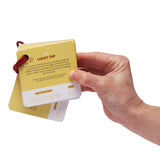 Hand holding a yellow activity card ring showing card #39 "Lucky Dip" with instructions.