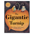 Book cover of The Gigantic Turnip featuring two small figures sitting atop a massive, orange turnip against a dark sky.