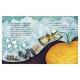 Illustration from The Enormous Turnip showing a line of people and animals pulling a giant turnip against a cloudy sky.