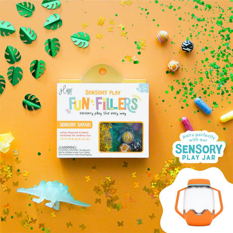 Glo Pals Sensory Safari Fun Fillers set surrounded by green leaf cutouts, confetti, and safari trinkets.
