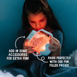 Child holding a glowing Glo Pals sensory play jar filled with water and accessories in the dark.
