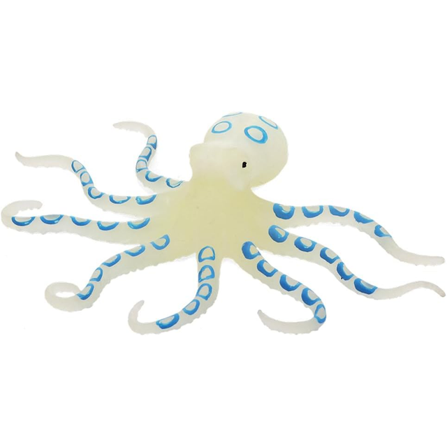 White octopus toy with blue-ring patterns on tentacles, spread in different directions, against a plain white background. The mood is playful and whimsical.