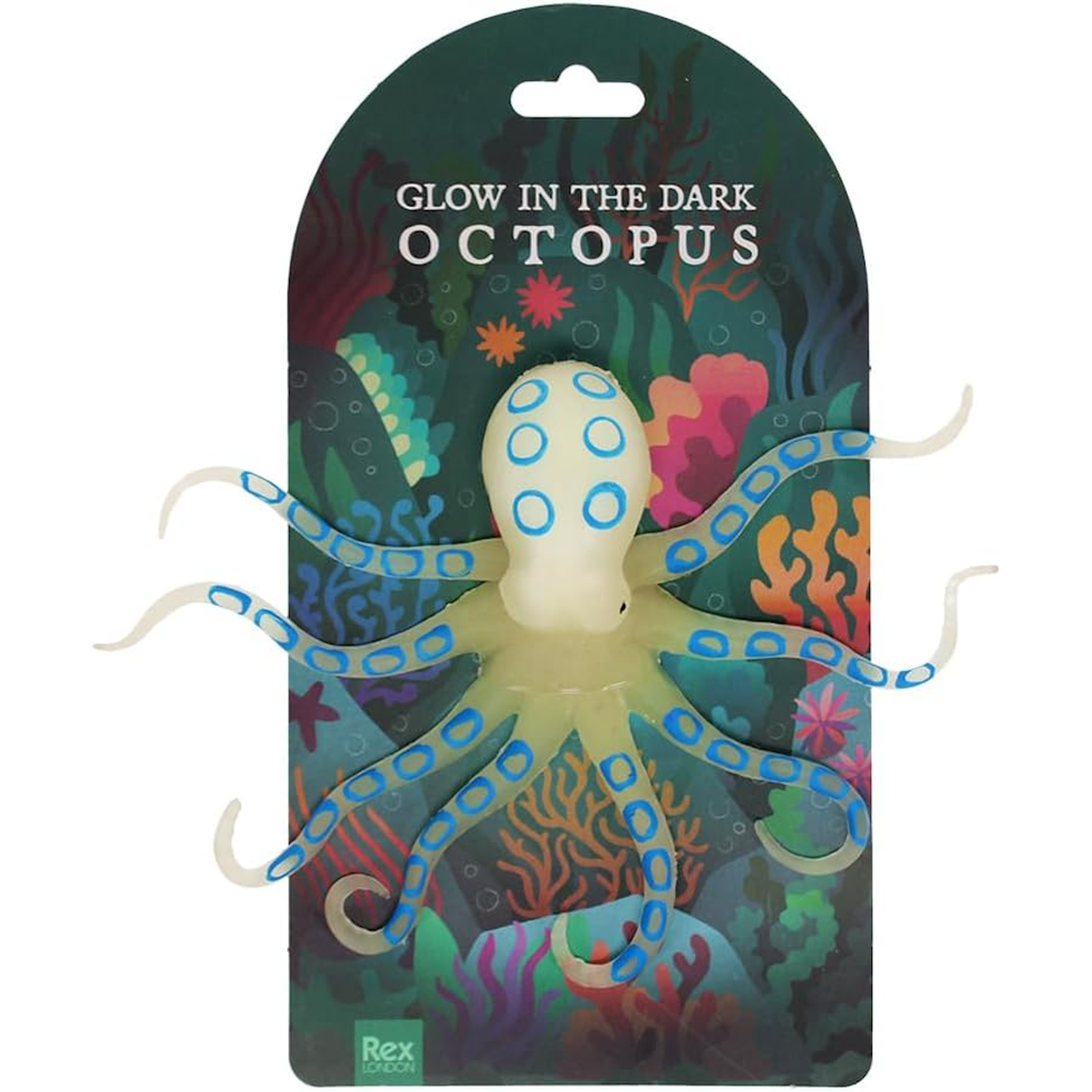 Glow-in-the-dark toy octopus with blue spots on a colorful underwater-themed card. Bright, playful design evokes a sense of curiosity and fun.