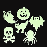Glow-in-the-dark Halloween stick-on shapes including a ghost, pumpkin, bat, cat, skull, and spider.