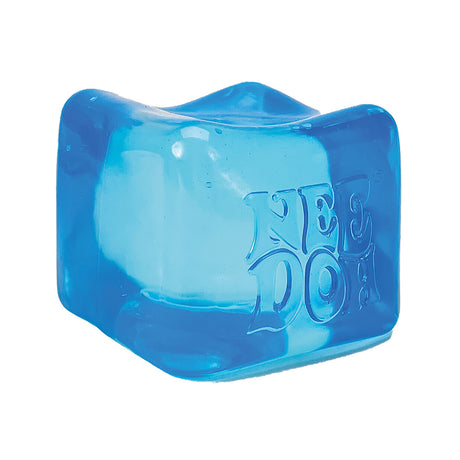 Blue, cube-shaped squishy stress ball with rounded edges and the word "Nee Doh" embossed on the side, conveying a playful, soothing vibe.