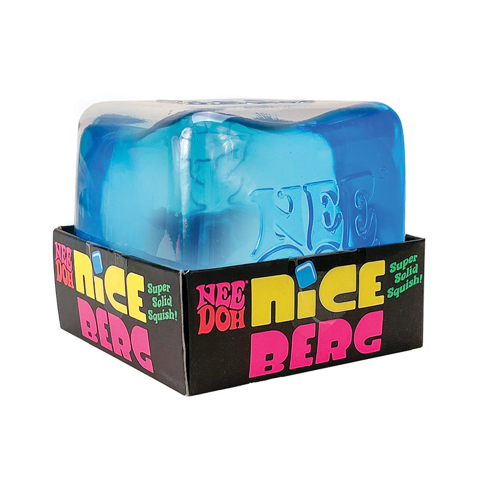 Blue Nee Doh squishy cube in black packaging with bold, colorful text: "Nee Doh Nice Berg, Super Solid Squish!" Bright and playful design.