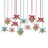 Hanging gold glitter star decorations tied with colorful satin ribbons and bows.