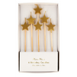 A set of shimmering gold star-shaped candles on sticks, perfect for adding a touch of sparkle to cakes and celebrations.