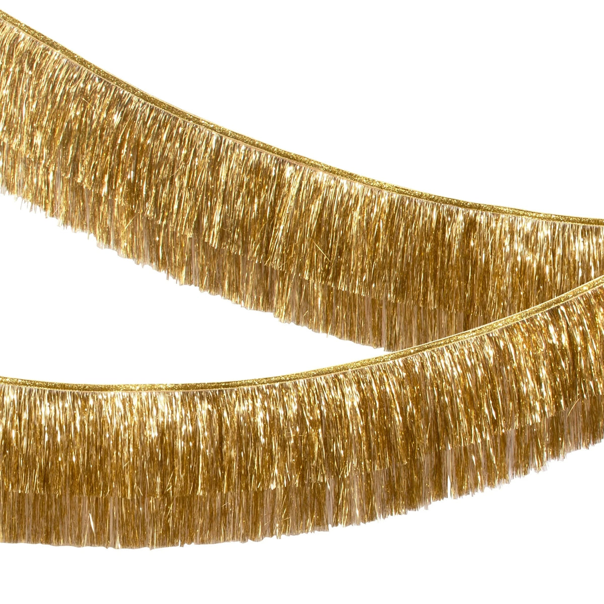 Side view of a double-layered metallic gold tinsel fringe garland swagged across a white background.