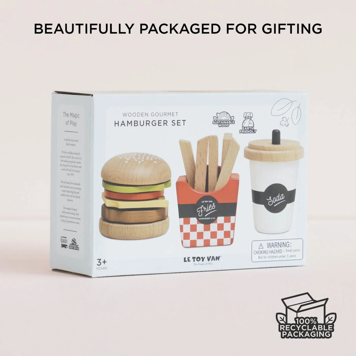 Product box for the wooden gourmet hamburger set, featuring images of the burger, fries, and soda cup.