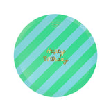 Round paper plate with green and blue diagonal stripes and gold text reading "Happy Birthday".