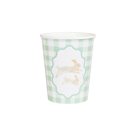 Green and white gingham paper cup featuring a central illustration of two running rabbits.